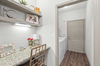 Hallway with wood/vinyl flooring